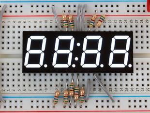 White 7-segment clock display with all segments lit