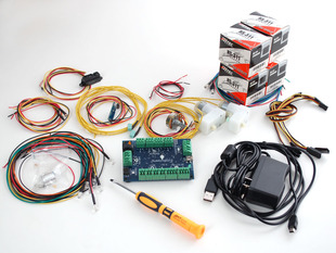 Hummingbird Robotics Kit - Collection of robot kit with board, many coiled wires and sensors, multiple motors and power supply.