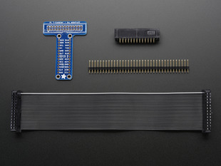 Kit contents for Adafruit Pi Unassembled T-Cobbler Breakout, including T-Cobber breakout, box header, male header, and black GPIO ribbon cable