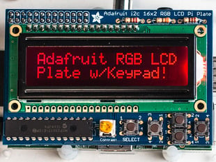 Top down view of a Adafruit RGB Negative 16x2 LCD+Keypad Kit for Raspberry Pi with Red background. 