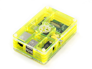 Angled shot of assembled neon-yellow-green acrylic enclosure for Raspberry Pi computer.