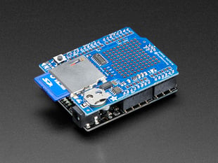Angled shot of a Adafruit Assembled Data Logging shield connected to an Arduino.
