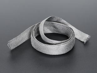Angled shot of a coiled Stainless Steel Conductive Ribbon.