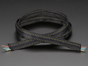 Front view of a tightly coiled Fabric Ribbon 4-Channel Wire.