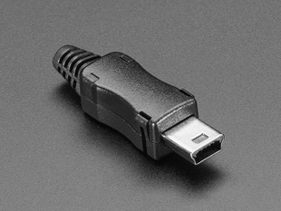 Angled shot of an assembled USB DIY Connector Shell with a Type Mini-B Plug. The male plug faces the camera at an angle.