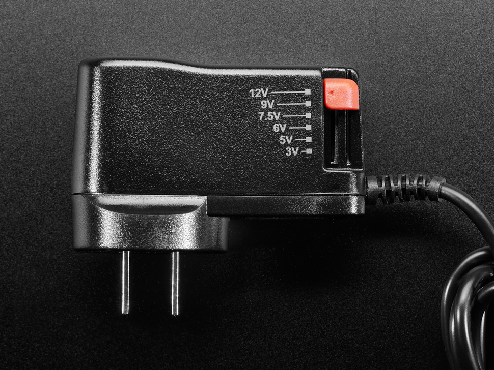 Top Down Close Up Shot of Plug Voltage Switch with 3V, 5V, 6V, 7.5V, 9V and 12V