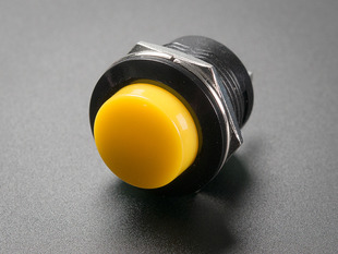 Angled shot of 16mm yellow panel mount pushbutton.