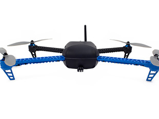 Front of IRIS Quad-copter with four propellers and antenna sticking out of center.