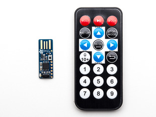 Image of Rectangular board and a small remote. 