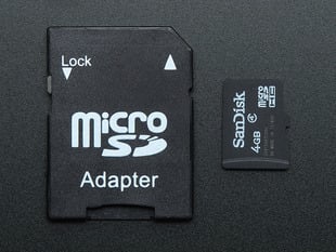 4GB Micro SD Card with NOOBS Lite 1.4 next to SD Adapter