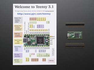 Teensy 3.1 with welcome pinout card and loose header