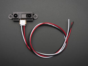 Top view of an IR distance sensor with cable.
