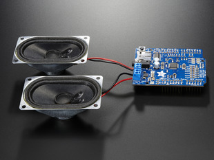Adafruit "Music Maker" MP3 Shield for Arduino w/3W Stereo Amp connected to a set of speakers. 