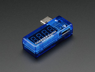 Angled shot of blue rectangular USB voltage and current meter.