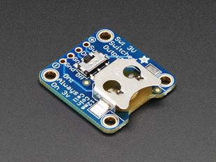 Angled shot of a 12mm Coin Cell Breakout Board with On-Off Switch.
