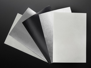 Collection of white, silver and black sheets