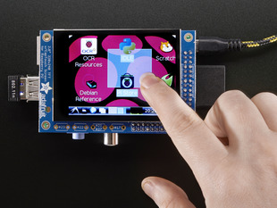 White hand touching the screen of a PiTFT 2.8" TFT 320x240 + Capacitive Touchscreen for Raspberry Pi. 