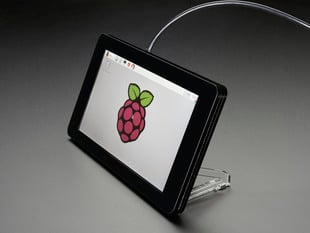 Angled shot of assembled Pimoroni Raspberry Pi 7" Touchscreen Display Case in Noir. A red raspberry logo appears on the display.