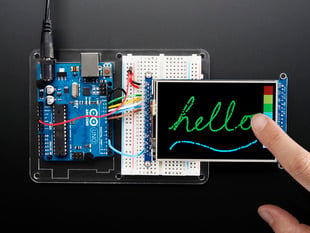 TFT breakout wired to arduino, hand drawing a cursive hello using touchscreen