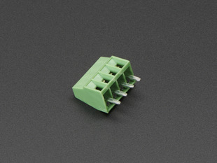 Angled shot of green 4-pin 2.54mm terminal block.