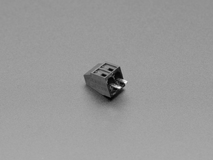 Angled shot of black 2-pin 2.54mm terminal block.