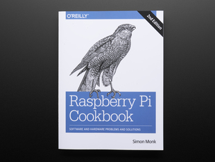 Front cover of technical book "Raspberry Pi Cookbook by Simon Monk - Second Edition". Cover features a black and white illustration of a bird.