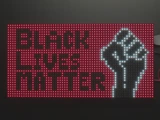 Vide of assembled and powered on 64x32 RGB LED Matrix Panel - 4mm pitch. The matrix displays "Black Lives Matter" alongside the Raised Fist.