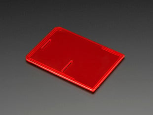 Angled shot of a Raspberry Pi Model B+ / Pi 2 / Pi 3 Case Lid - Red. 