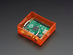 Angled shot of orange Raspberry Pi Model A+ Case without lid.
