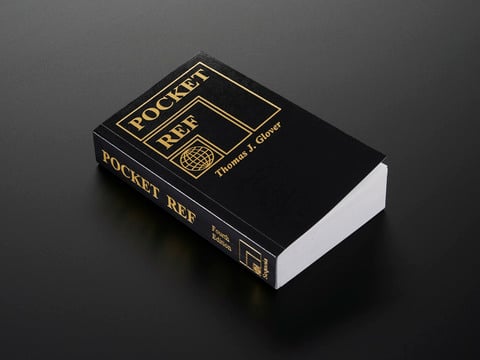 Angled shot of black tome Pocket Ref - 4th Edition - by Thomas J. Glover.