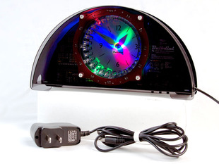 Assembled hemispherical clock with colorful analog display.