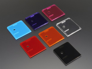Angled shot of group of variously colored lid covers for Raspberry Pi Model A+ Cases.