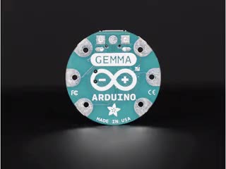 Video of a rotatting Arduino GEMMA - Miniature wearable electronic platform.
