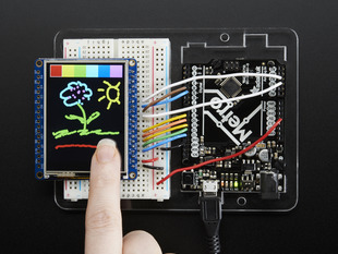 TFT breakout wired to arduino, hand doodling of a flower and a sun using touchscreen