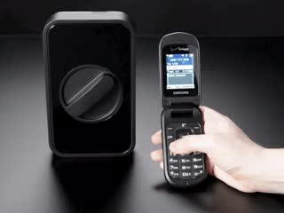 Lockitron Motorized Door Lock Body being opened by cell phone