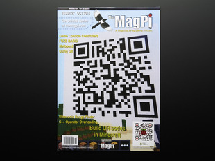 Front cover of magazine "The MagPi - Issue 27" featuring building QR codes in video game "Minecraft"