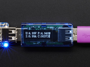 Top view of USB Voltage Meter with OLED Display that reads various measurements.
