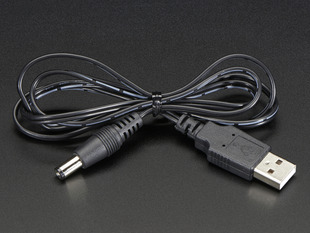 Shot of a coiled USB to 2.1mm Male Barrel Jack Cable.