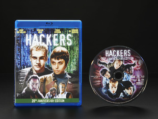 DVD cover of 1995 film "Hackers" next to the DVD disc.