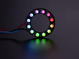 NeoPixel Ring with 12 x 5050 RGBW LEDs lighting up rainbow and white