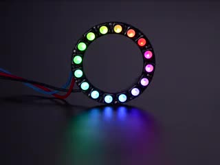 NeoPixel Ring with 16 x 5050 RGBW LEDs lighting up rainbow and white