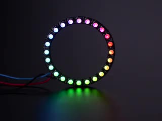 NeoPixel Ring with 24 x 5050 RGBW LEDs lighting up rainbow and white