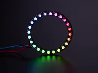 NeoPixel Ring with 24 x 5050 RGBW LEDs lighting up rainbow and white