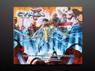 Front cover of "The Cynja: Volume 1" by Chase Cunningham and Heather Dahl and illustrated by Shirow de Rosso. A powerful cyber-warrior wields two swords amid a a chaoic, warlike background.