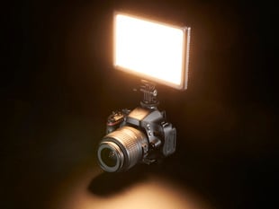Camera-Mounted LED Photography Light lit warm white