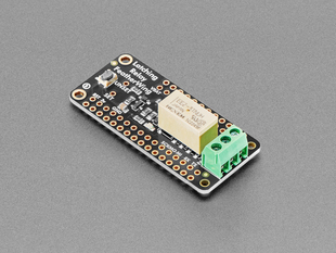 Angled shot of a Adafruit Non-Latching Mini Relay FeatherWing. 