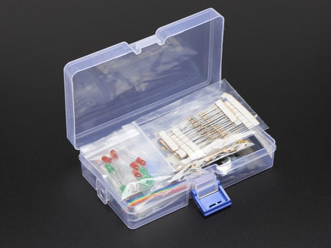 A plastic storage box full of various electrical components.