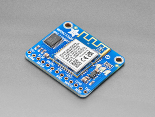 Angled shot of blue, square WiFi breakout board.
