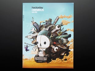 Front cover of "Hackaday Omnibus - Vol. 02 - 2015" Art illustration is of a Mad Max-like vehicular contraption with the skull Hackaday logo.