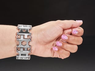 Wrist with chunky metal bracelet